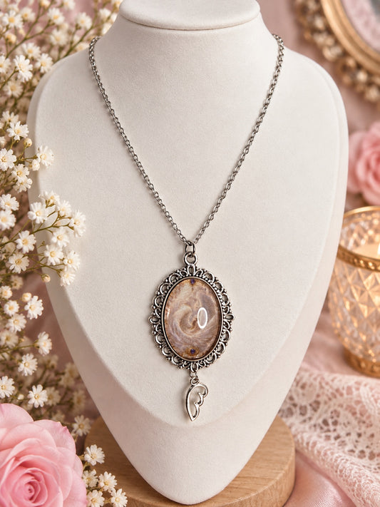 Aureole Keepsake angelcore necklace with ornate silver pendant and wing charm