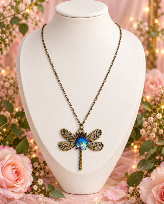 Azurewing Dragonfly Necklace with antique bronze-tone openwork wings and an iridescent blue scale-pattern centre