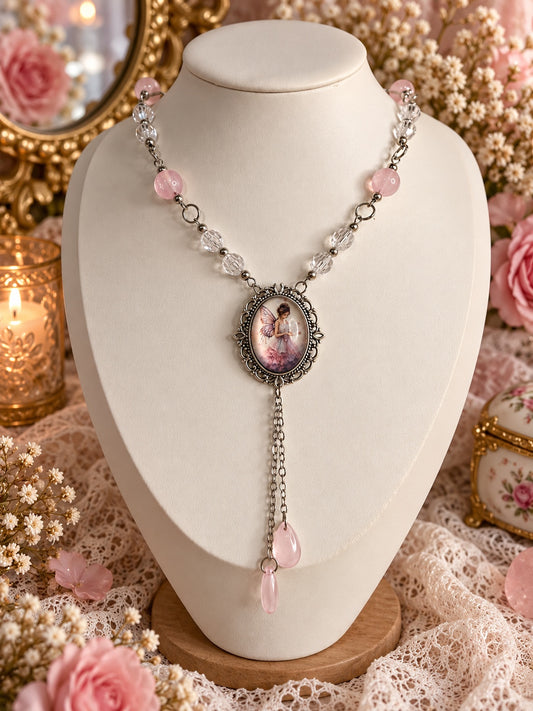 Silver-tone fairy portrait necklace with pink round beads, clear faceted beads and two dangling pink teardrops