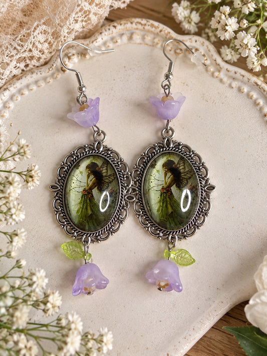 Fairycore and dark fairycore silver-tone cameo earrings with lavender flowers, green leaves and lilac bell flowers