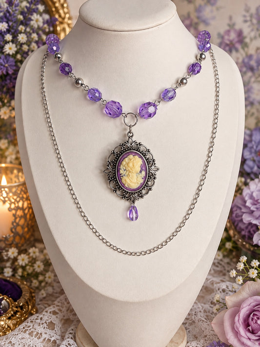 Second view of purple and silver-tone layered cameo necklace