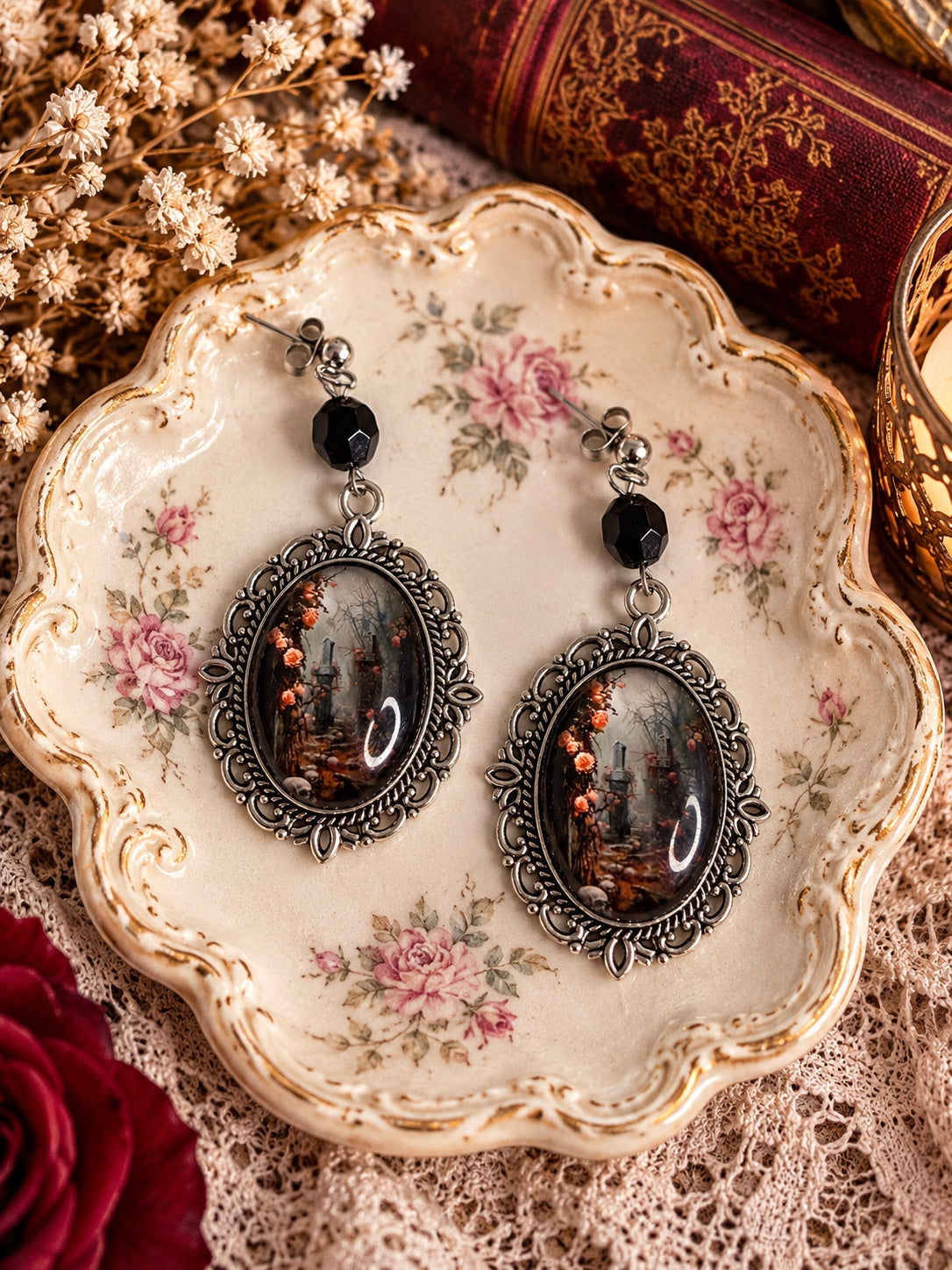 Mourningpath Rose Earrings with black faceted beads, silver-tone oval frames and a misty graveyard rose design