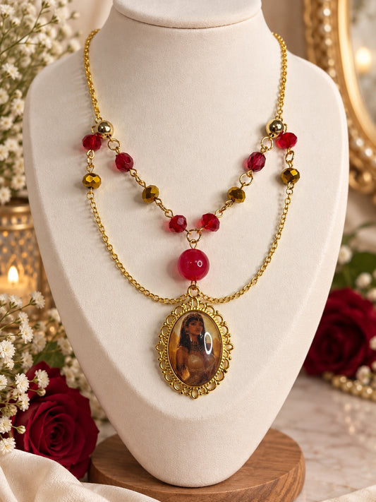 Layered gold-tone Egyptian-inspired cameo necklace with red and gold beads