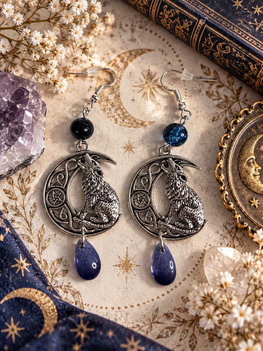 Silver-tone howling wolf crescent moon earrings with dark blue beads and violet teardrop charms