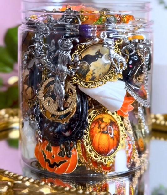 Halloween mystery jewelry jar with black cat cameo, pumpkins, ghost and gothic charms