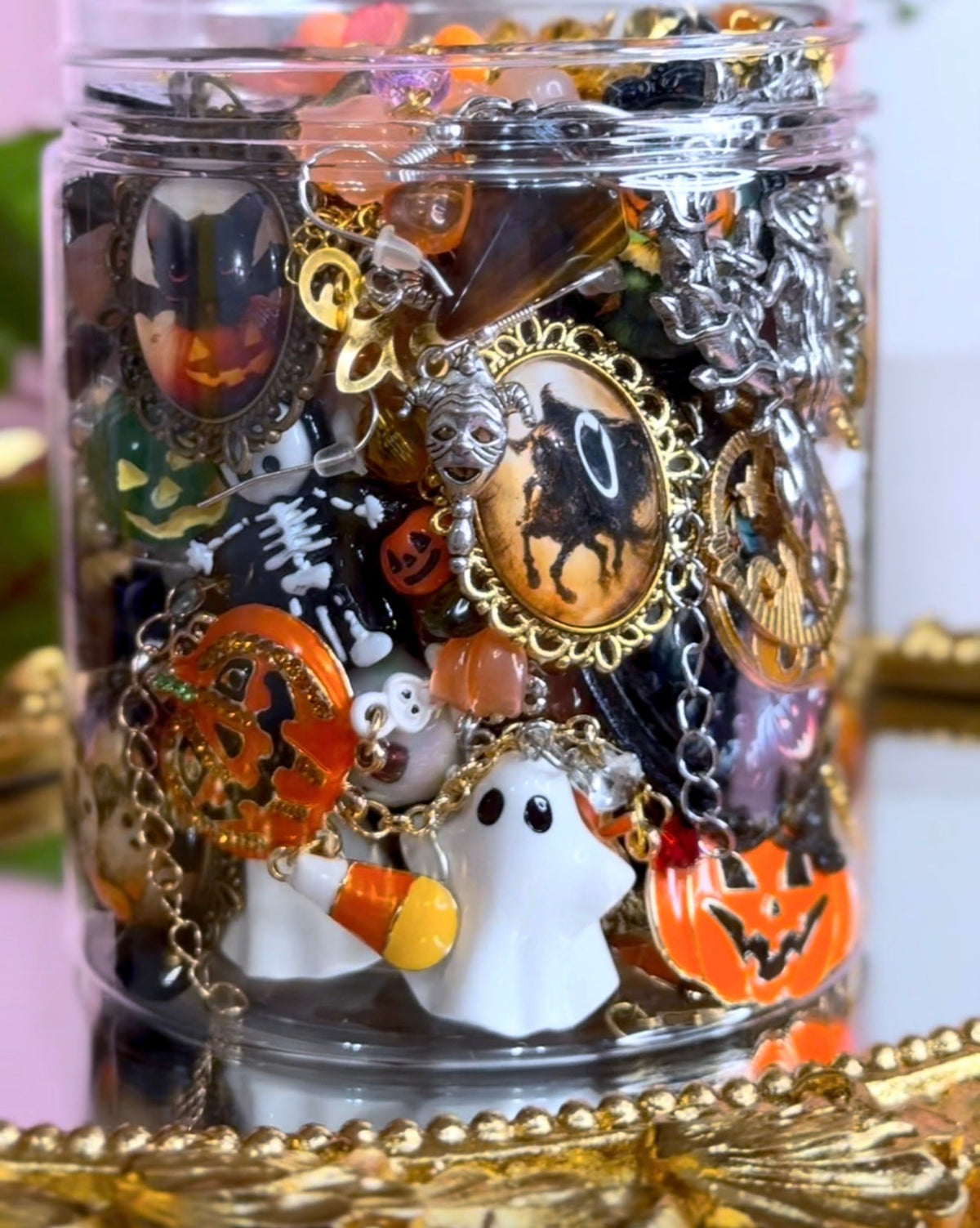 Halloween mystery jewelry jar packed with ghost, pumpkin, skeleton and spooky cameo pieces