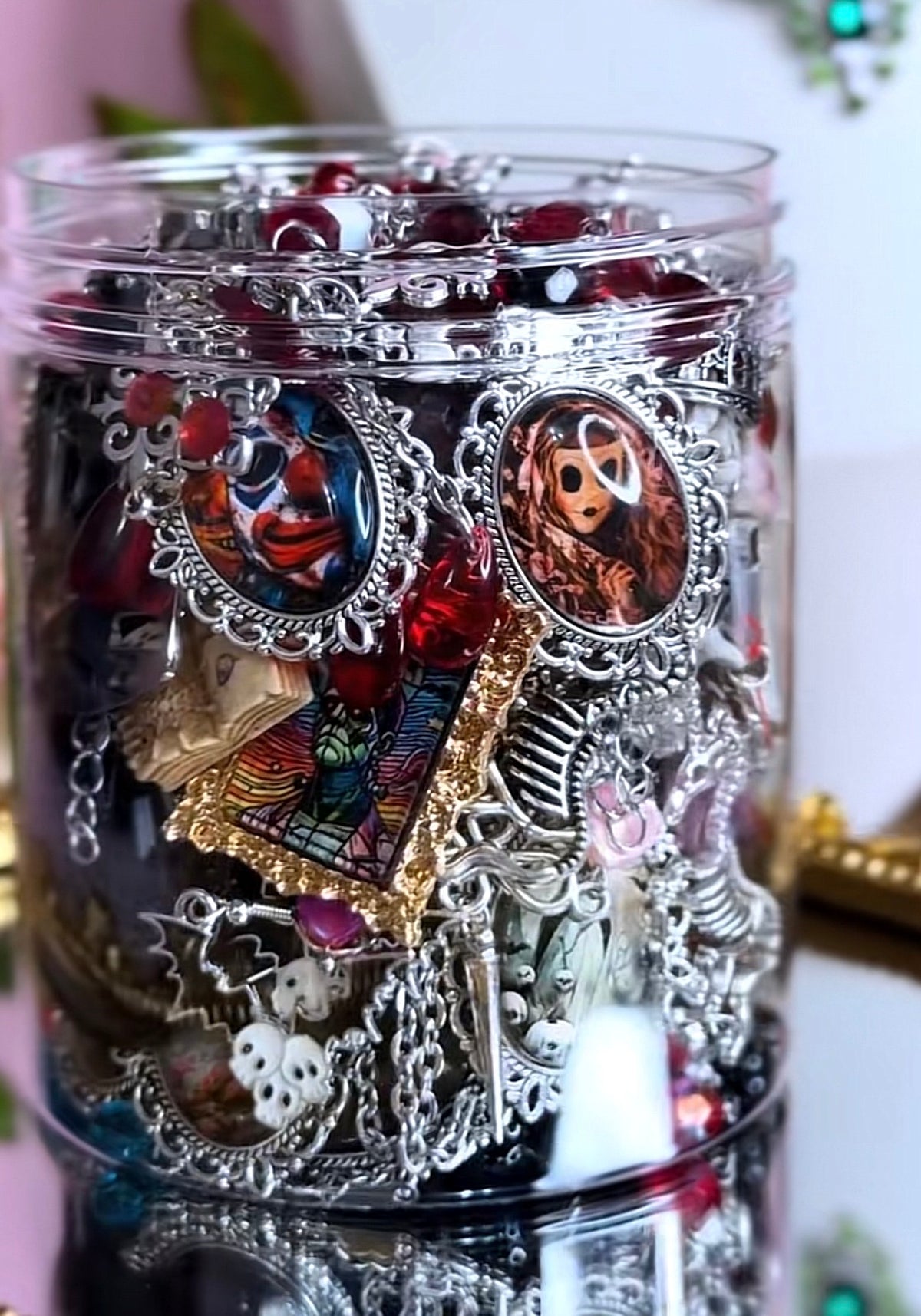 Patricia Braham inspired horror mystery jewelry jar filled with red, black, silver and gothic horror jewelry