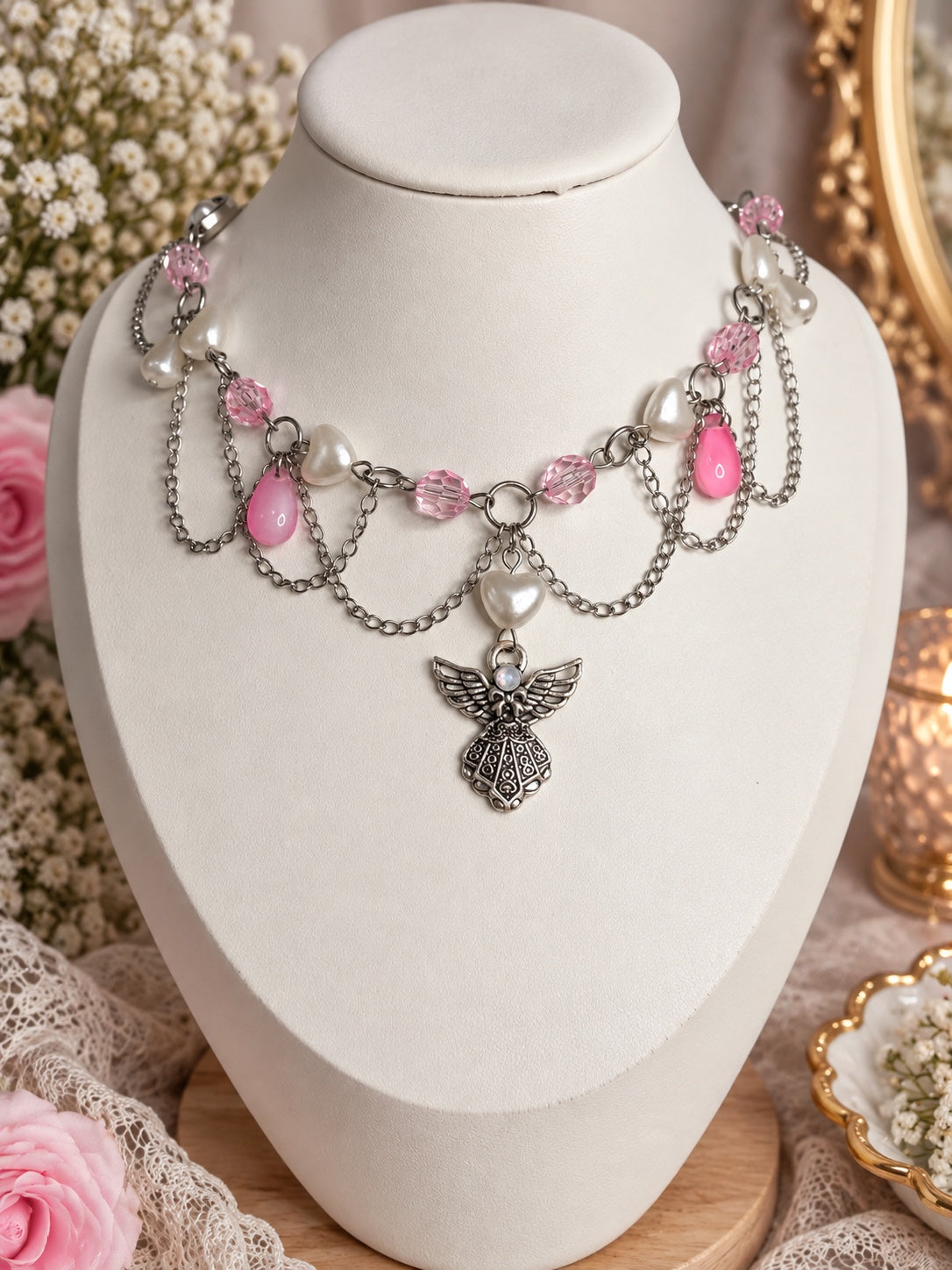 Pink and silver angelcore statement necklace with pearl hearts, crystal beads, draped chains and angel charm