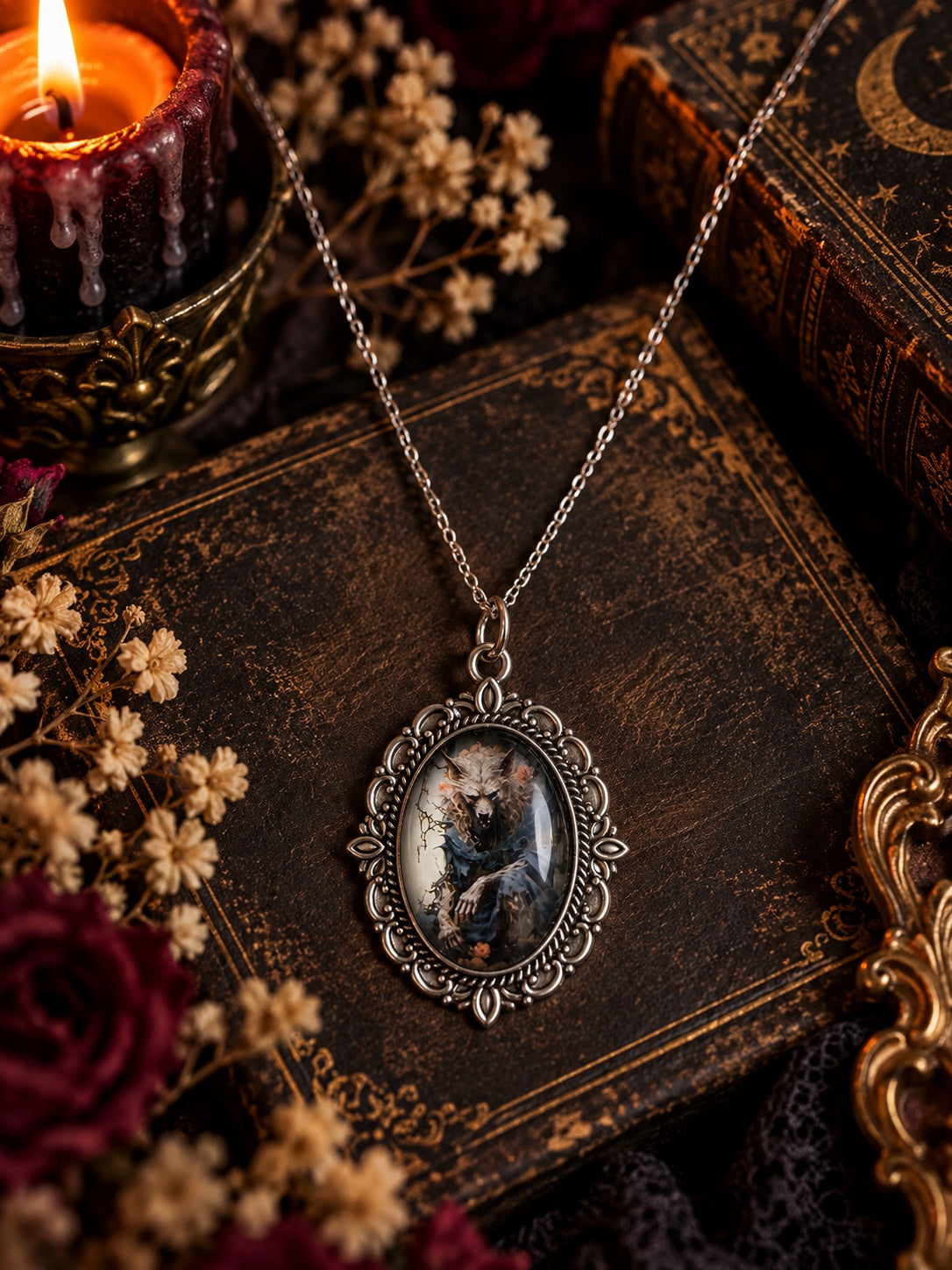 Silver-tone ornate oval necklace with a snarling wolf-like creature portrait