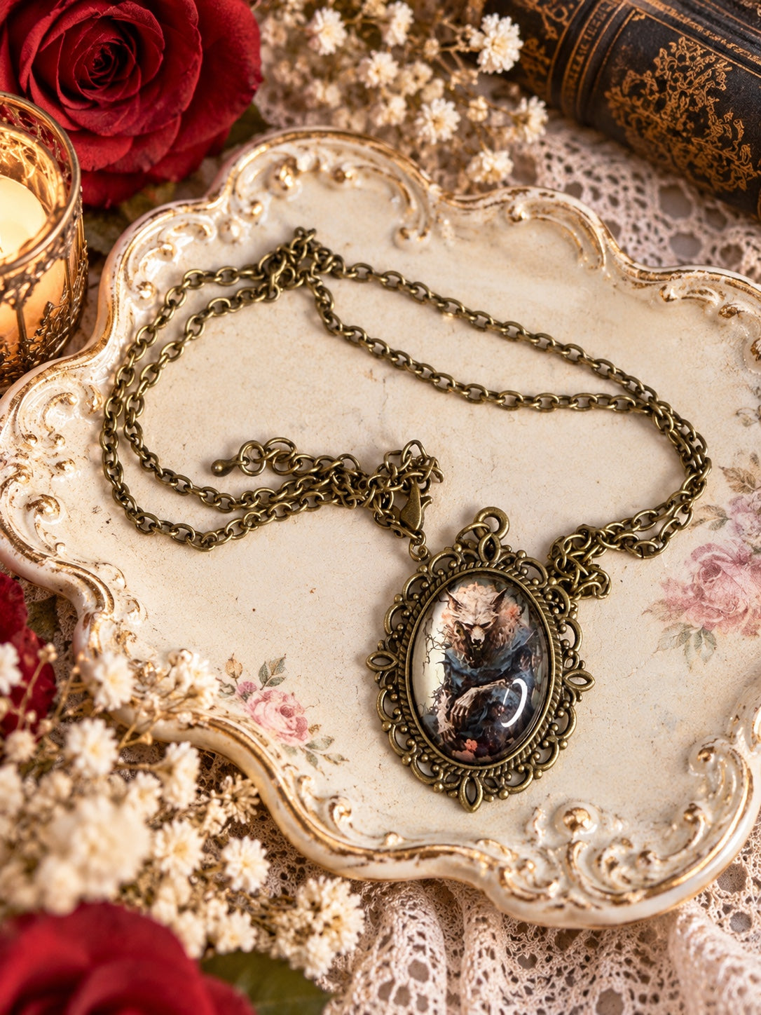 Antique bronze-tone necklace with an ornate oval cameo depicting a sinister wolf-like familiar